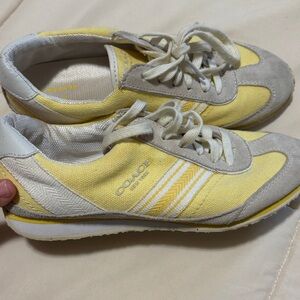 Coach yellow sneakers